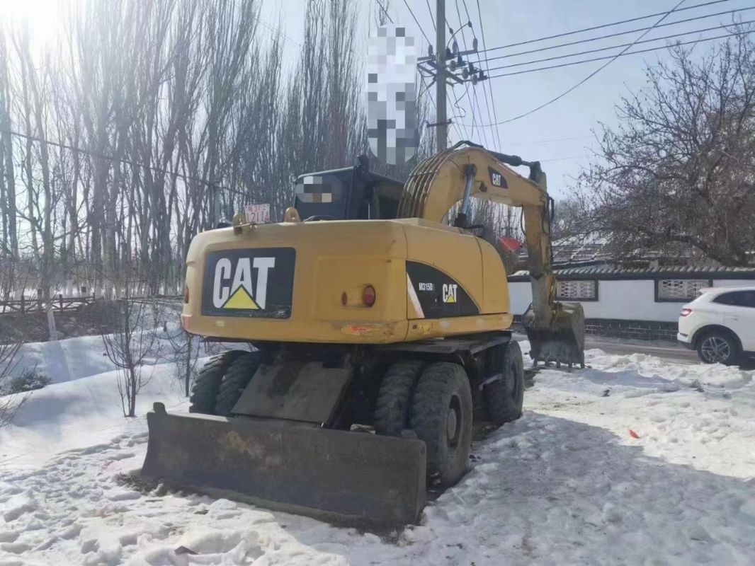 Έτοιμος για εργασία Caterpillar M315D Χρησιμοποιούμενος εξορυκτής τροχών με μικρό ωράριο εργασίας και σε καλή κατάσταση