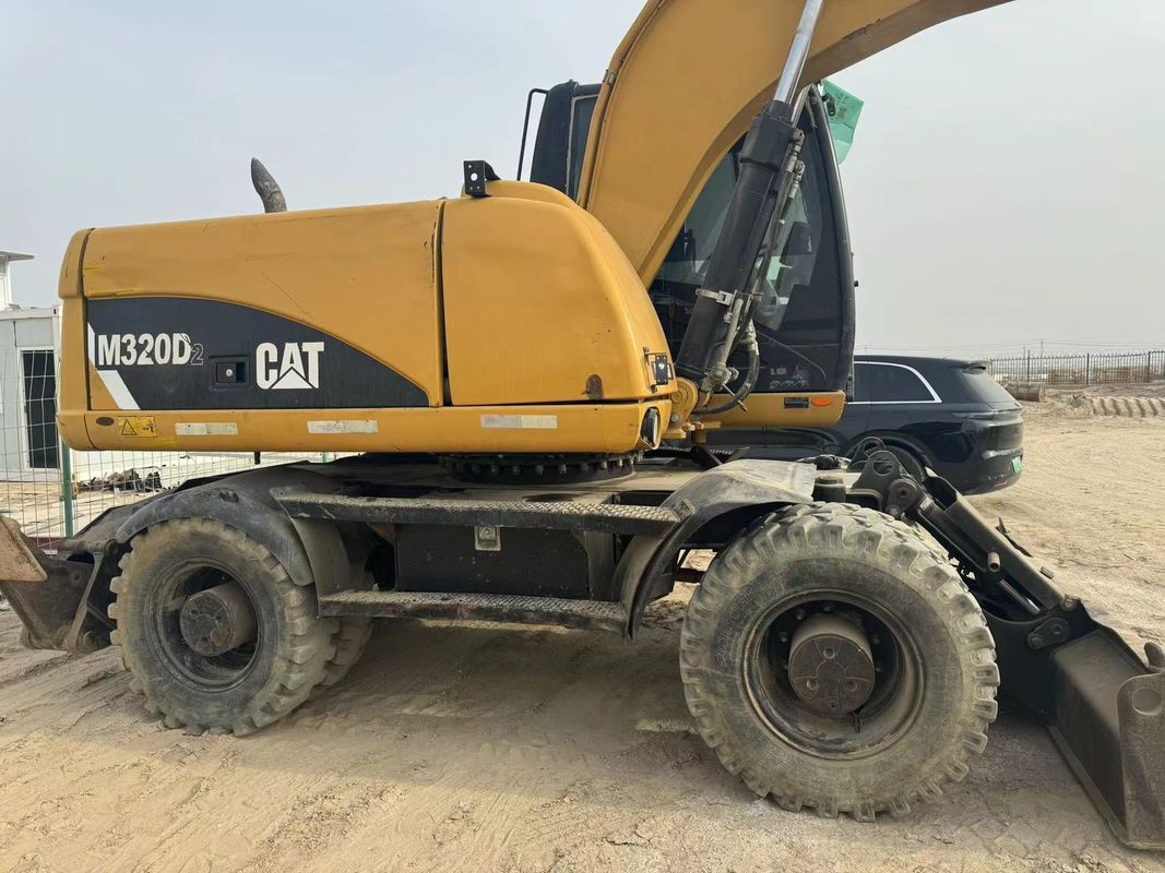 90% Caterpillar M317D2 Χρησιμοποιούμενος εξορυκτής τροχών υψηλής ποιότητας και καλύτερης απόδοσης προς πώληση