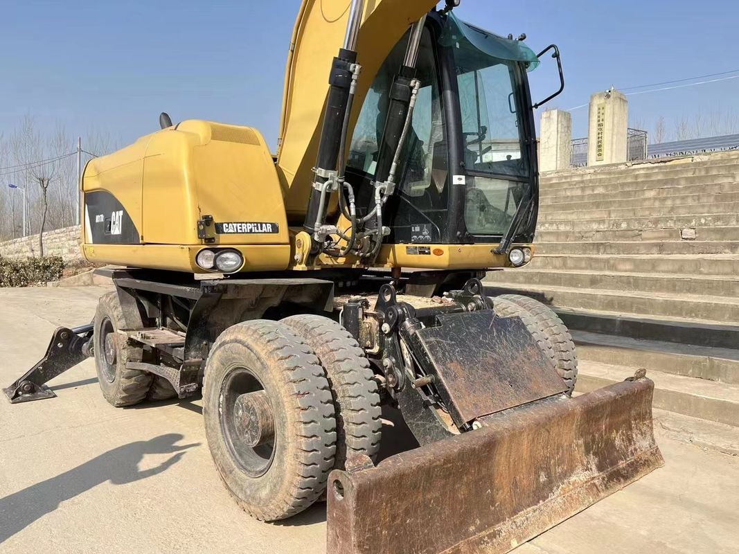 90% Caterpillar M317D2 Χρησιμοποιούμενος εξορυκτής τροχών υψηλής ποιότητας και καλύτερης απόδοσης προς πώληση