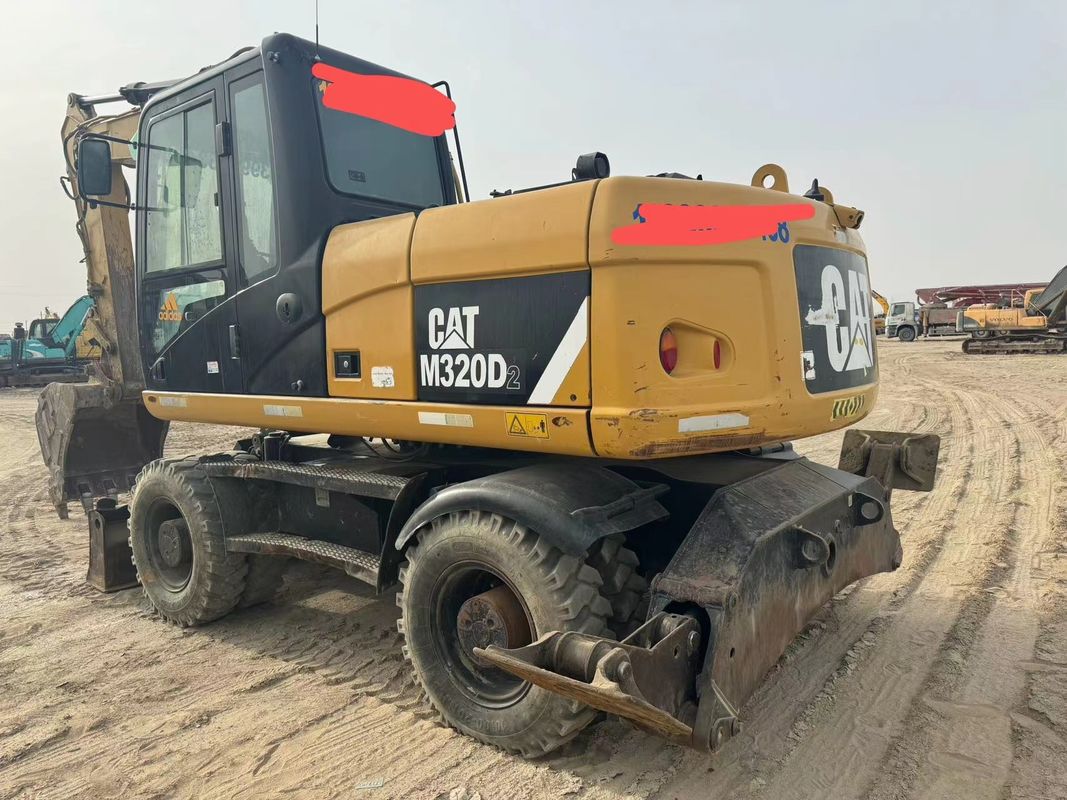 90% Caterpillar M317D2 Χρησιμοποιούμενος εξορυκτής τροχών υψηλής ποιότητας και καλύτερης απόδοσης προς πώληση